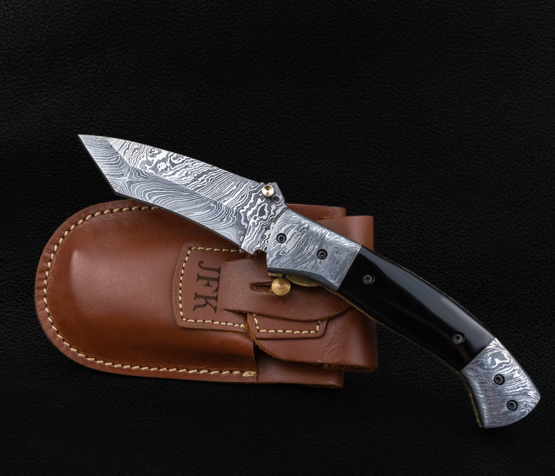 Curved Hand Forged Black Damascus Folding Knife