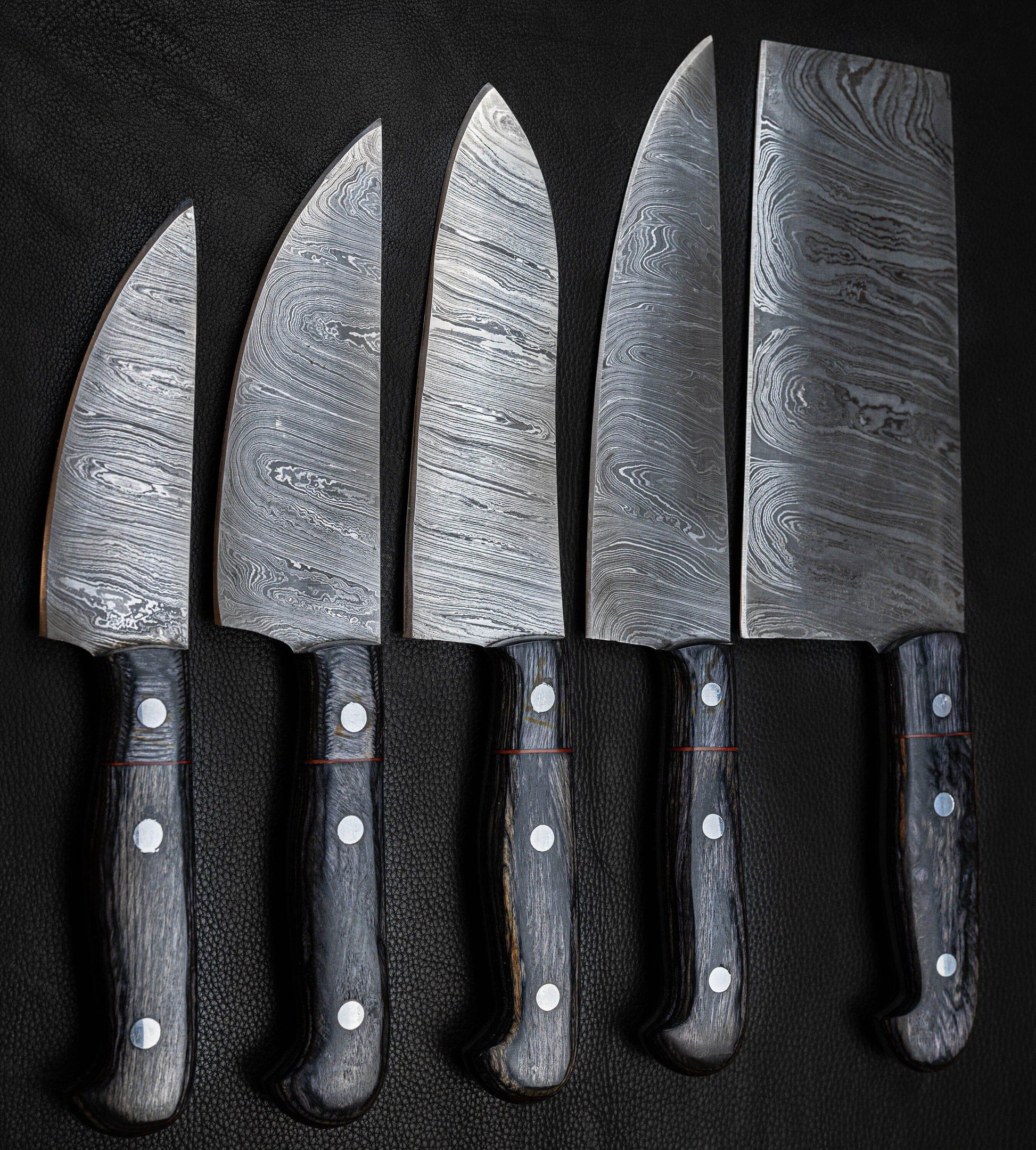 https://www.morfsteel.com/cdn/shop/products/5-pieces-handmade-damascus-kitchen-knife-chef-s-knife-set-morf-steel-9.jpg?v=1673556648&width=1946