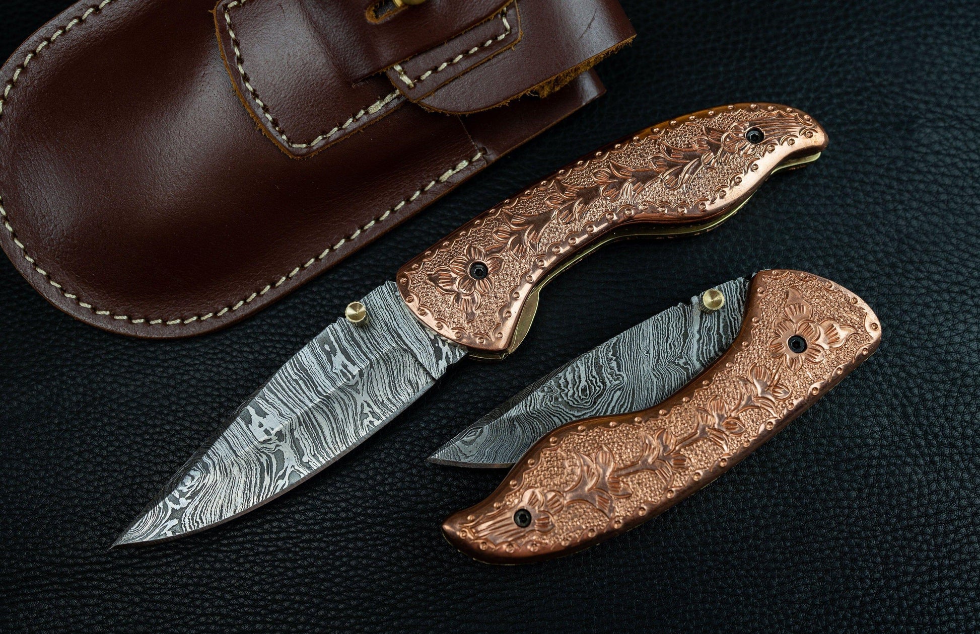 Watch how this breathtaking Copper Damascus knife is forged from